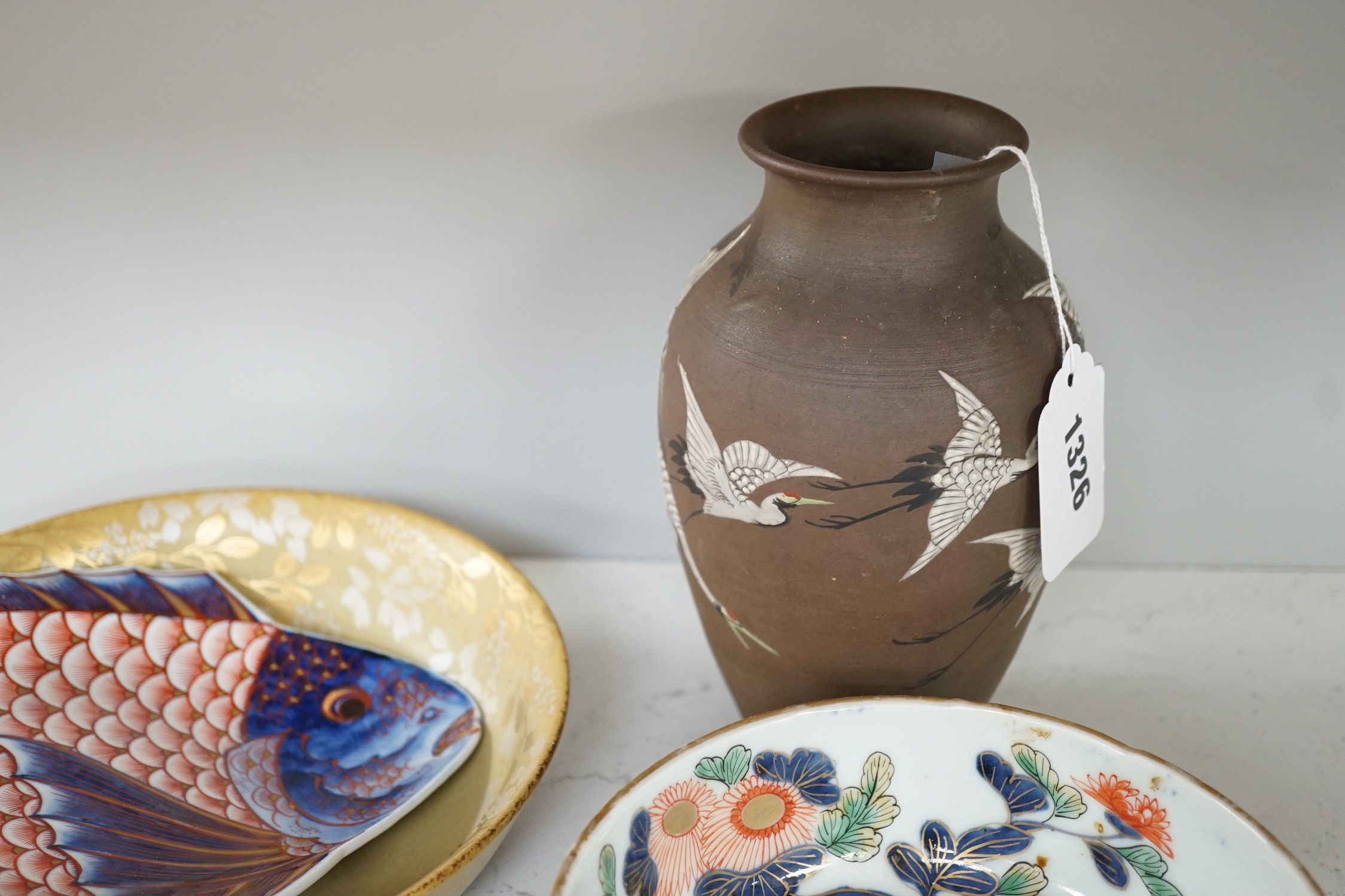 A group of 19th/20th century Japanese ceramics, Including five dishes, three vases, a cup, a Satsuma box and cover and a model of a dog